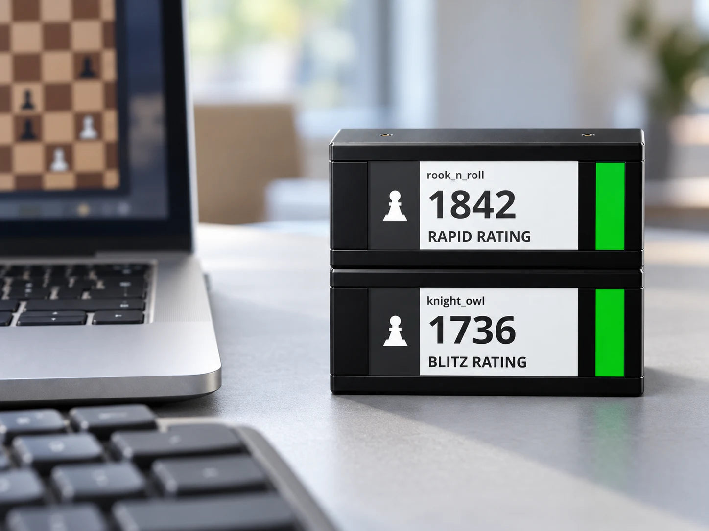 Two stacked TickrMeters showing Rapid 1842 and Blitz 1736 beside a laptop